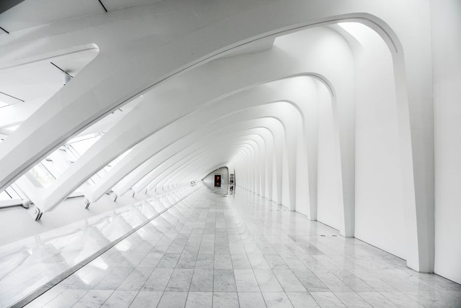 Explore the sweeping modern arches and minimalistic design of the Milwaukee Art Museum's white hallway