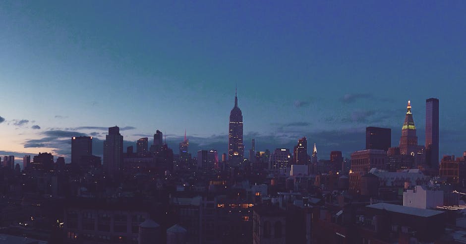 Captivating view of the New York City skyline at dusk featuring the iconic Empire State Building.